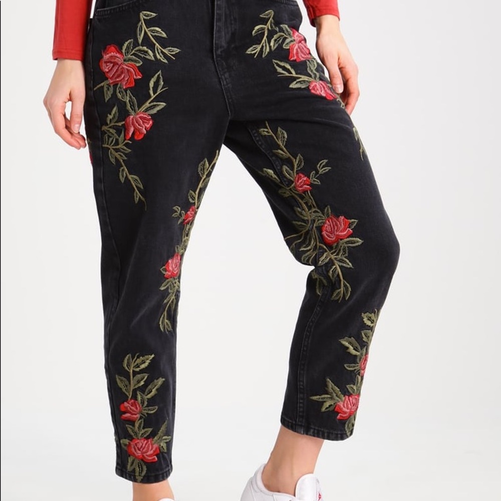 Black embroidered rose jeans